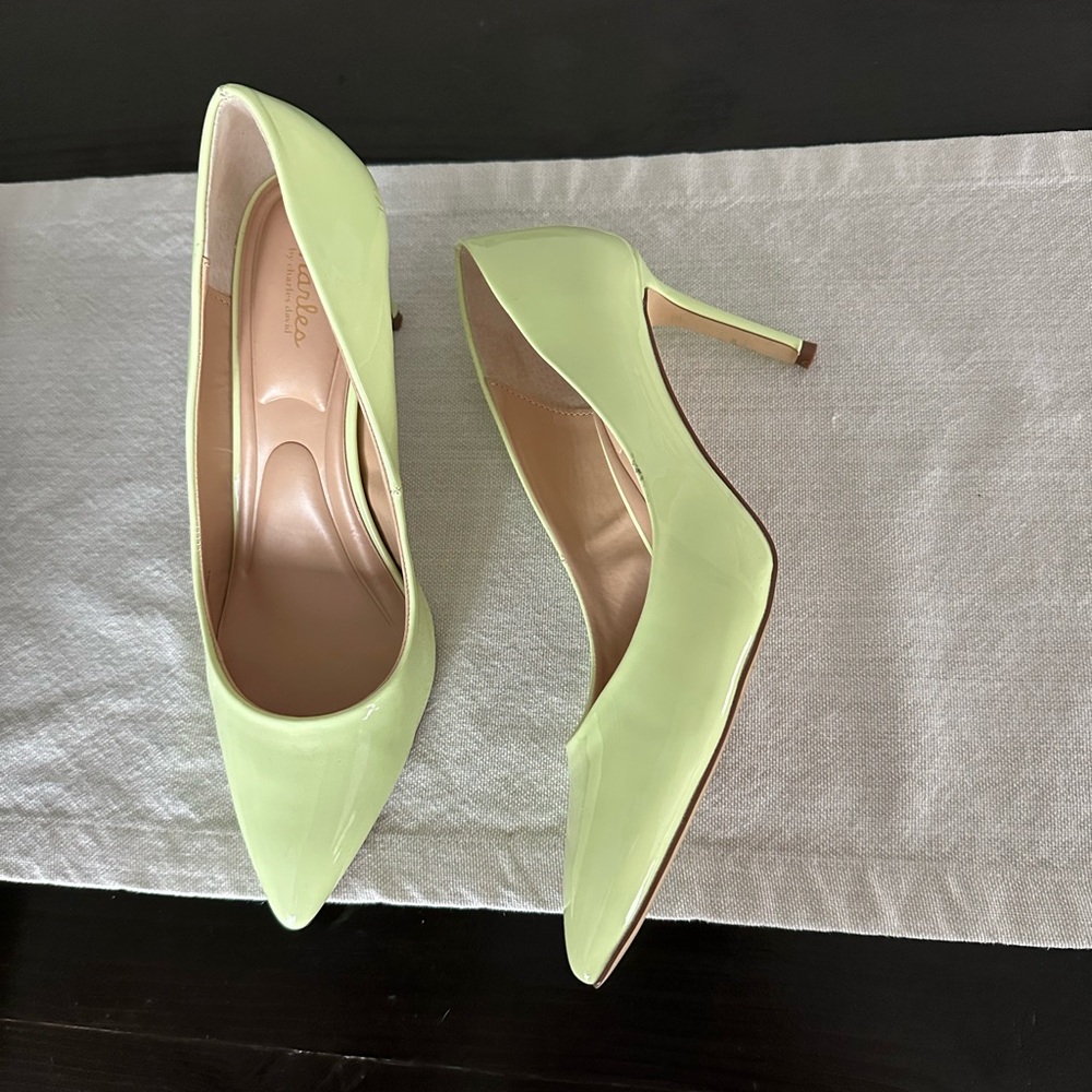 Bright yellow colored pumps